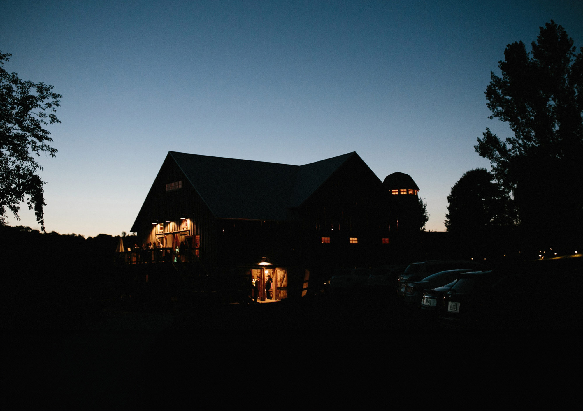 night photo of the starry night barn